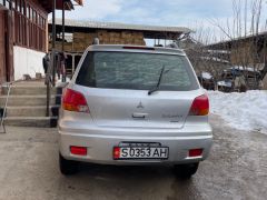 Сүрөт унаа Mitsubishi Outlander