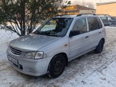 Photo of the vehicle Mazda Demio