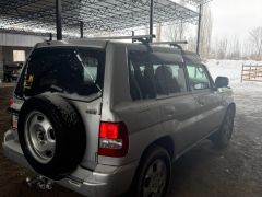 Сүрөт унаа Mitsubishi Pajero iO