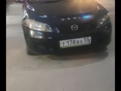 Фото авто Mazda Demio