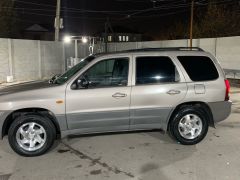 Photo of the vehicle Mazda Tribute