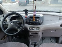 Photo of the vehicle Nissan Almera Tino