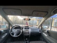 Сүрөт унаа Suzuki Liana