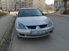 Фото авто Mitsubishi Lancer