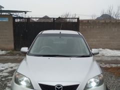 Фото авто Mazda Demio