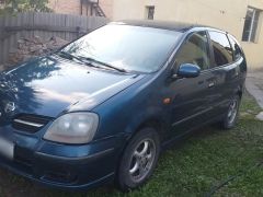 Фото авто Nissan Almera Tino