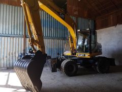 Сүрөт унаа Caterpillar M315