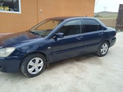 Фото авто Mitsubishi Lancer