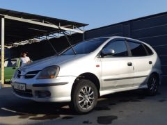 Фото авто Nissan Almera Tino