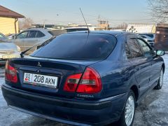 Сүрөт унаа Mitsubishi Carisma