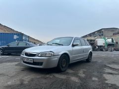 Фото авто Mazda 323