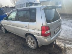 Сүрөт унаа Mazda Demio