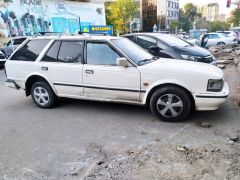 Фото авто Nissan Bluebird