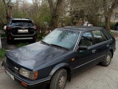 Сүрөт унаа Mazda 323