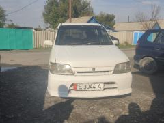 Сүрөт унаа Nissan Cube