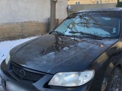 Photo of the vehicle Mazda Protege