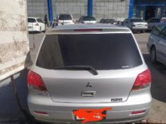 Фото авто Mitsubishi Airtrek