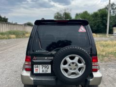 Сүрөт унаа Mitsubishi Pajero Junior