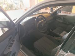 Сүрөт унаа Mazda 323