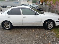 Photo of the vehicle Nissan Sunny