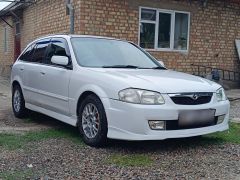 Фото авто Mazda Familia