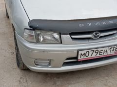 Photo of the vehicle Mazda Demio