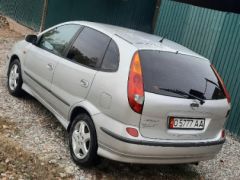 Photo of the vehicle Nissan Almera Tino