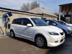 Сүрөт унаа Mazda Demio