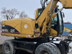 Фото авто Caterpillar M315