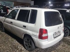 Photo of the vehicle Mazda Demio