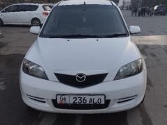 Photo of the vehicle Mazda Demio