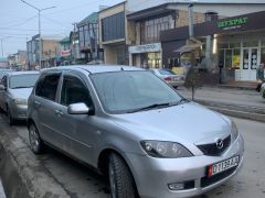 Photo of the vehicle Mazda Demio