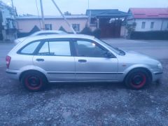 Сүрөт унаа Mazda 323