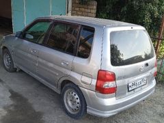 Photo of the vehicle Mazda Demio