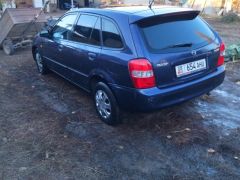 Сүрөт унаа Mazda 323