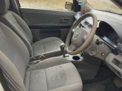 Photo of the vehicle Mazda Demio