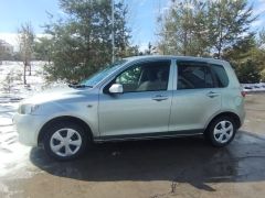 Сүрөт унаа Mazda Demio