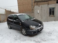 Фото авто Nissan Almera Tino