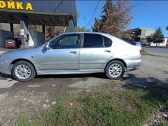 Фото авто Nissan Primera