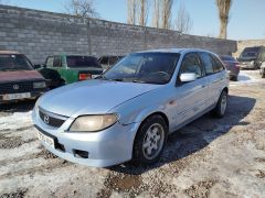 Фото авто Mazda 323