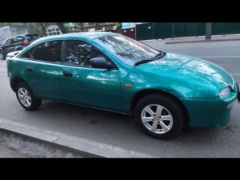 Photo of the vehicle Mazda 323