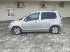 Photo of the vehicle Mazda Demio