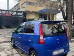 Photo of the vehicle Daihatsu Cuore