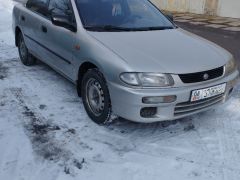 Сүрөт унаа Mazda 323