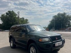 Сүрөт унаа Mitsubishi Montero Sport