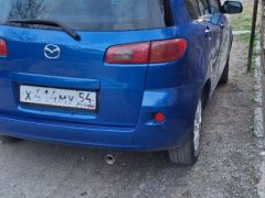 Сүрөт унаа Mazda Demio