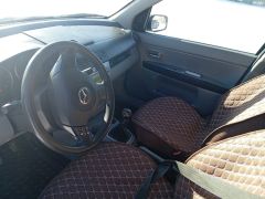 Photo of the vehicle Mazda Demio