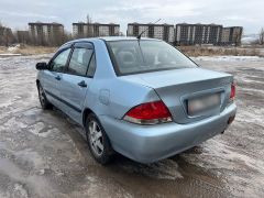 Фото авто Mitsubishi Lancer