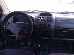 Фото авто Suzuki Wagon R+