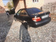 Photo of the vehicle Nissan Almera